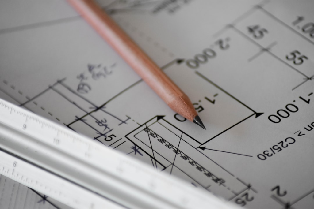 Architectural floor plans and pencil prepared for a building project
