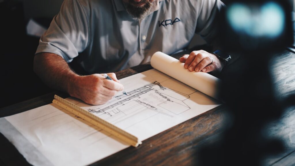 Architect reviewing plans for a home remodeling project